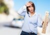 23 Effective Home Remedies for Heat Rash (Prickly Heat) in Adults and Babies Woman feeling hot during summer heat wave